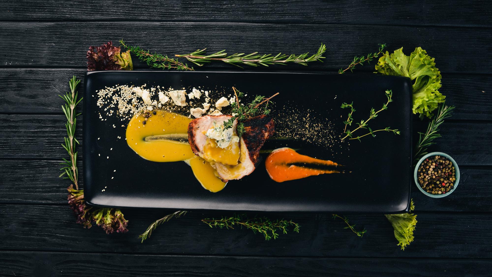 Plated seasonal starter on dark surface